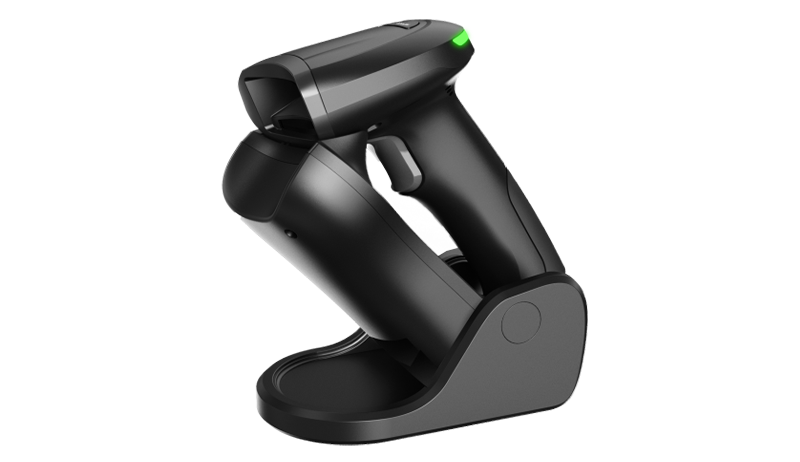 Handheld streckkodskanner on a table.